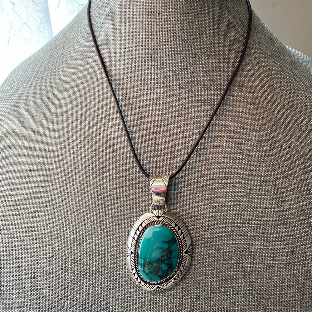 Signed J Nelson Turquoise and Silver pendant